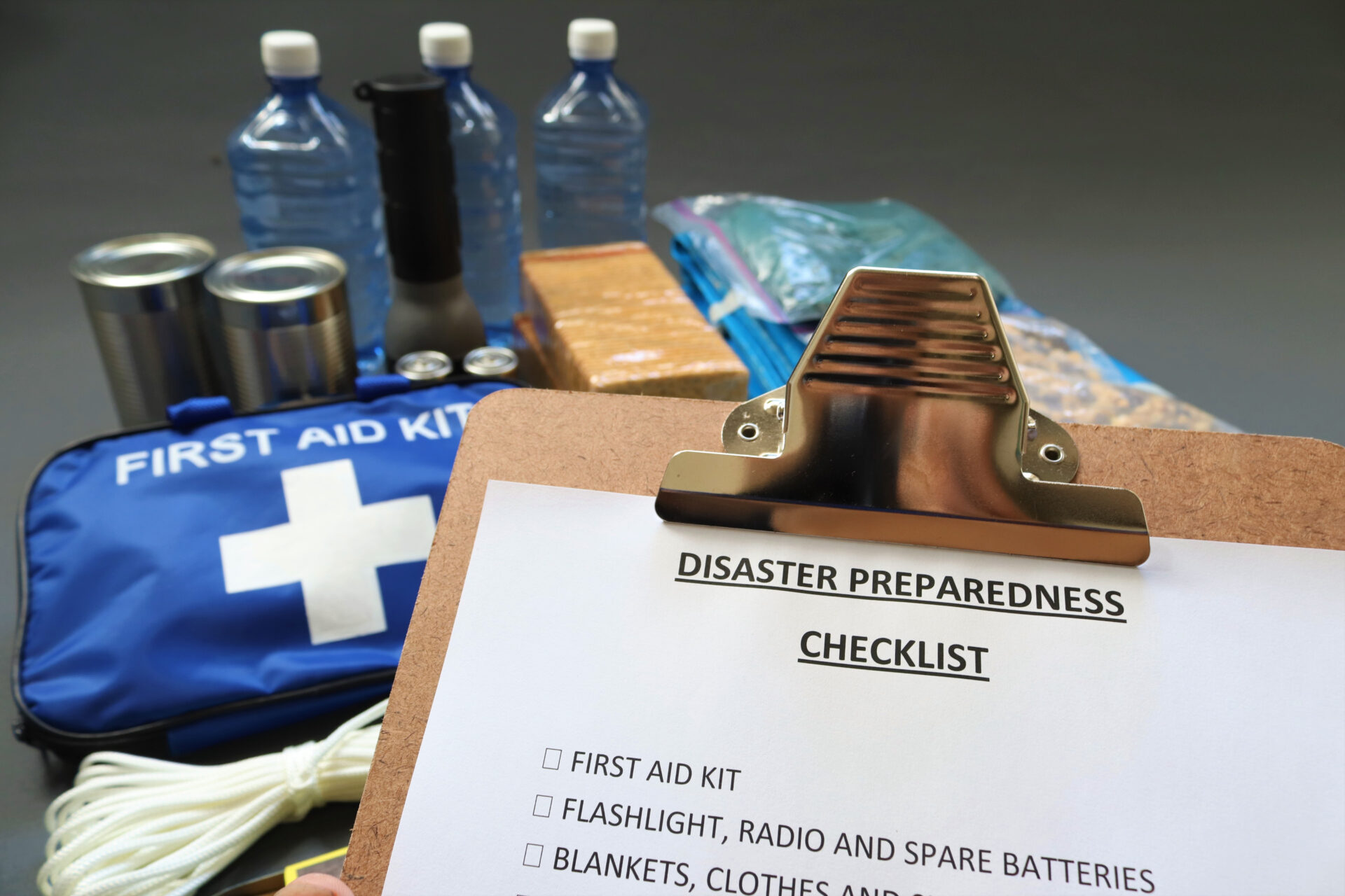 A homeowner prepares for an emergency with an emergency preparedness checklist.